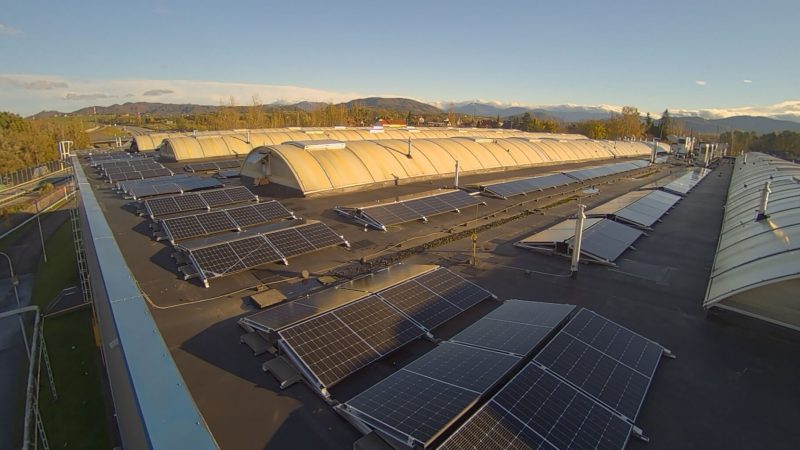 aerial view of solar panels on top of building
